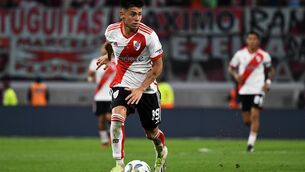 <p>Claudio Echeverri of River Plate controls the ball during the Trofeo de Campeones.</p>