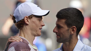 <p>Jannik Sinner, left, is congratulated by Novak Djokovic. Pic: Asanka Brendon Ratnayake/AP</p>