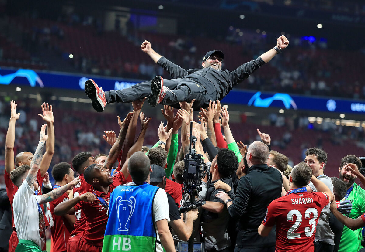 Liverpool manager Jurgen Klopp lifted up by his players after they won the UEFA Champions League final on June 1, 2019 in Madrid. Picture: Peter Byrne/PA
