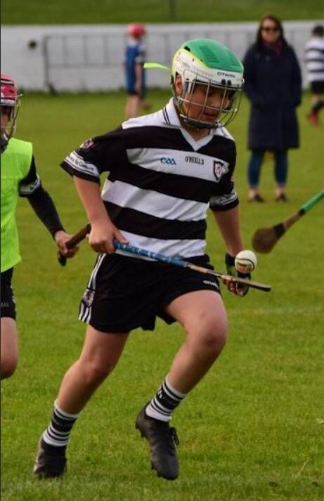 Kacper Kozlwski playing hurling for Midleton. Pic: Midleton GAA