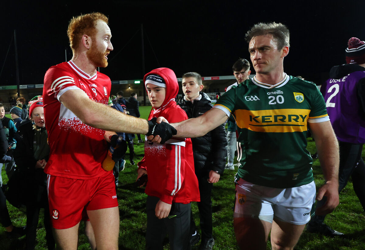 Derry’s Conor Glass and Stephen O'Brien of Kerry after the game
