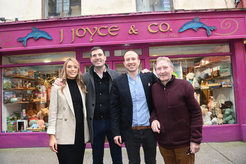  Clíodhna and Paul Montgomery of Clancy's, with Salvatore Toscano of Rossini's and Gerard McCarthy of Gerard McCarthy Trophies outside J Joyce and Co in advance of the holiday weekend street market on Princes St in Cork. Picture: Larry Cummins