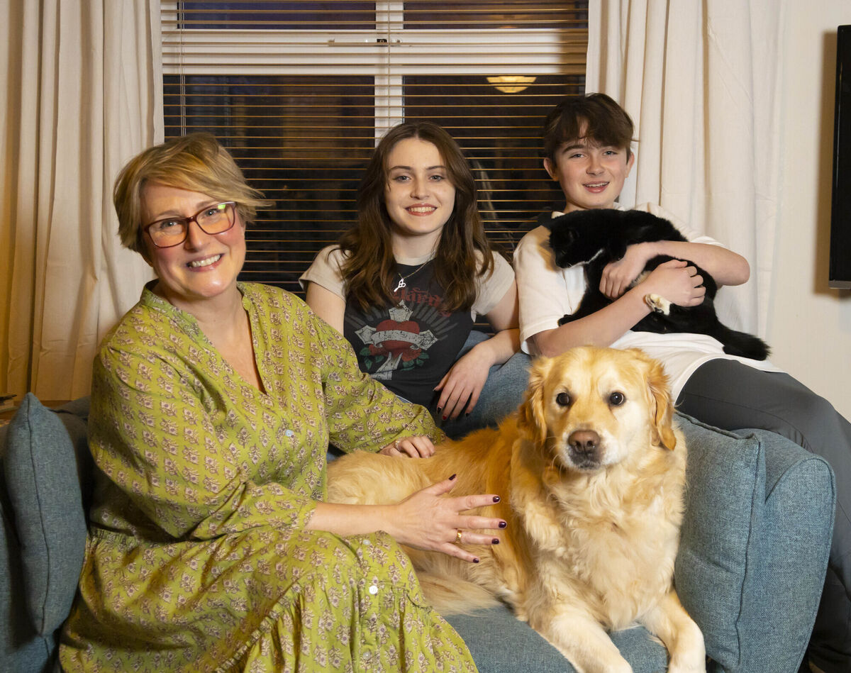 Eve McDonnell with her twins, Faye and Bobby, and their dog Happy and cat Socket at home near Gorey, Co. Wexford. Photograph: Patrick Browne