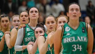 <p>Aine O'Connor of Ireland, and her teammates stand for the national anthems before the FIBA Women's EuroBasket Championship qualifier match between Ireland and France at the National Basketball Arena in Tallaght, Dublin. Photo by Brendan Moran/Sportsfile</p>