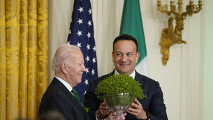 <p>Taoiseach Leo Varadkar (right) presents US president Joe Biden with a bowl of shamrock at the White House in 2023.</p>