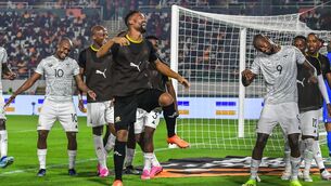 <p>SHOCK: South Africa's forward #9 Evidence Makgopa (R) celebrates with teammates. Photo by SIA KAMBOU/AFP via Getty Images.</p>