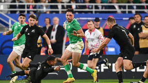 <p>Hugo Keenan of Ireland evades the tackle of Aaron Smith and Sam Cane of New Zealand during the 2023 Rugby World Cup quarter-final match between Ireland and New Zealand at the Stade de France in Paris, France. Pic: Harry Murphy, Sportsfile</p>