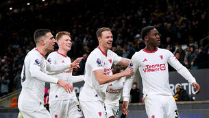 <p>SEVEN-GOAL THRILLER: Manchester United's Kobbie Mainoo (right) celebrates scoring their side's fourth goal of the game during the Premier League match at the Molineux Stadium, Wolverhampton. Pic: Paige Young </p>