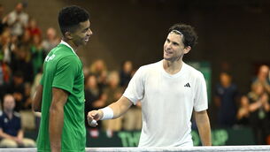 <p>TOP COMPETITOR: Dominic Thiem of Austria, right, and Michael Agwi of Ireland after their singles match on day one of the Davis Cup World Group I Play-off 1st Round match between Ireland and Austria at UL Sport Arena. Pic: Brendan Moran, Sportsfile</p>