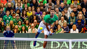 <p>MAMMOTH TASK: Ireland's Michael Agwi taking on Austria's former US Open champion Dominic Thiem in the first singles match of the Davis Cup. Pic: Kieran Ryan-Benson</p>