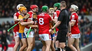 <p>BITE: Match referee Paul Faloon keeps a close eye as players jostle. Photo by Ray McManus/Sportsfile</p>