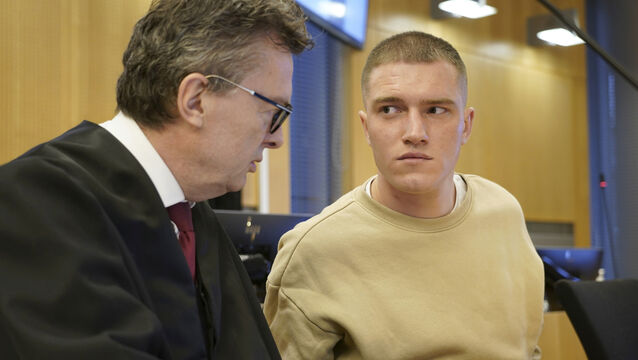Former member of the Russian private military contractor Wagner Group Andrey Medvedev, right, listens to his lawyer Brynjulf Risnes during a court hearing in Oslo, on April 25, 2023 (Gorm Kallestad/NTB Scanpix via AP)