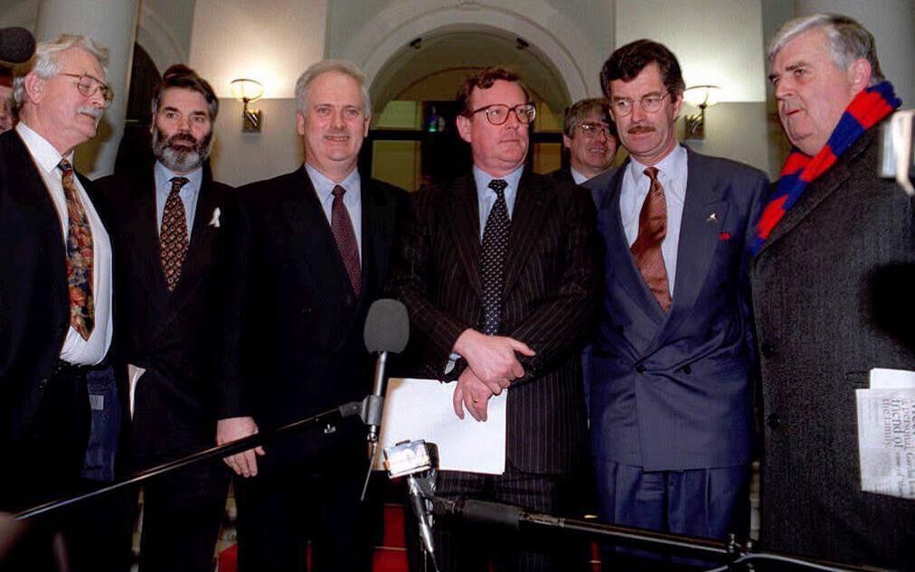 The taoiseach John Bruton, third from left, with Ulster Unionist Ken Maginnis, Democratic Left leader Proinsias de Rossa, UUP leader David Trimble, then foreign minister Dick Spring, and Ulster Unionist John Taylor in Dublin for peace process talks. File picture: PA The taoiseach John Bruton, third from left, with Ulster Unionist Ken Maginnis, Democratic Left leader Proinsias de Rossa, UUP leader David Trimble, then foreign minister Dick Spring, and Ulster Unionist John Taylor in Dublin for peace process talks. File picture: PA