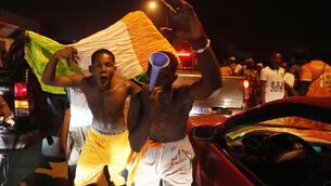 <p>OLE: Ivory Coast soccer fans celebrate on a street in Bouake, Ivory Coast after Ivory Coast won the African Cup of Nations quarter final soccer. AP Photo/Sunday Alamba.</p>