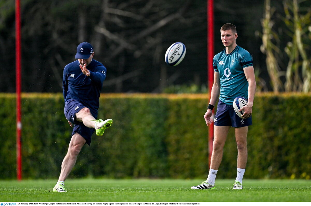 Sam Prendergast, right, watches assistant coach Mike Catt during an Ireland Rugby squad training session at The Campus in Quinta da Lago, Portugal. Photo by Brendan Moran/Sportsfile Sam Prendergast, right, watches assistant coach Mike Catt during an Ireland Rugby squad training session at The Campus in Quinta da Lago, Portugal. Photo by Brendan Moran/Sportsfile