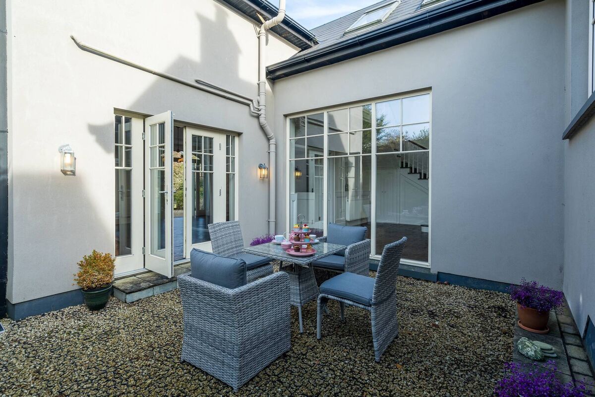 Courtyard nestled between the link corridor and the kitchen 