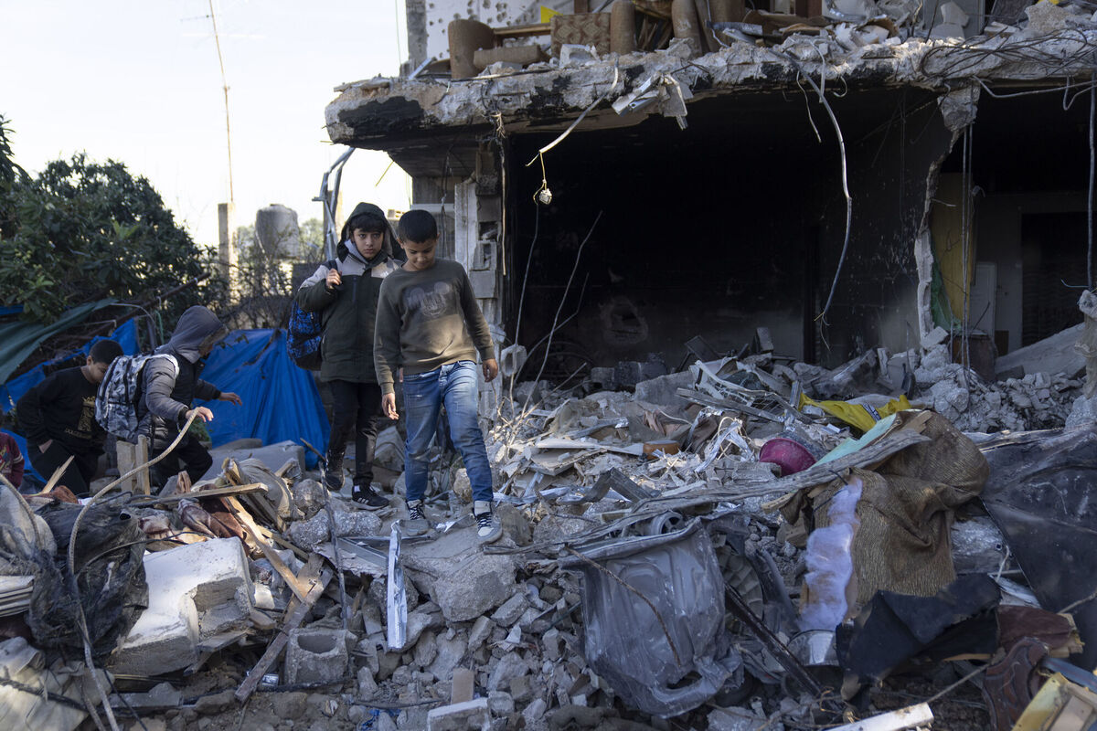Palestinian children inspect a destroyed house following an Israeli army operation, in the West Bank refugee camp of Nour Shams, Tulkarem. Picture: AP Photo/Nasser Nasser