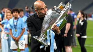 <p>Pep Guardiola has dismissed talk of another glorious treble (Martin Rickett/PA)</p>