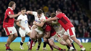 <p>ARTISANS OVER ARTISTS: England's Theo Dan is tackled during the Guinness Six Nations match at Twickenham Stadium, London. Pic: Andrew Matthews/PA Wire</p>