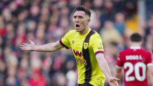 <p>IRELAND'S CALL: Burnley's Dara O'Shea celebrates after scoring his side'equaliser against Liverpool at Anfield. Pic credit: AP Photo/Jon Super.</p>