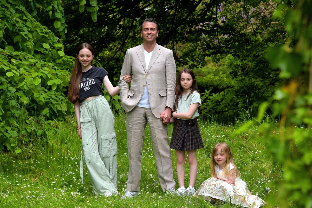 Richard Hogan with his daughters Sophie, 6, Lizzie, 9, and Hannah, 12. Photograph Moya Nolan Richard Hogan with his daughters Sophie, 6, Lizzie, 9, and Hannah, 12. Photograph Moya Nolan