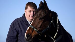 <p>Trainer John "Shark" Hanlon with horse Hewick during a media day at Shark Hanlon's yard in Fenniscourt, Ireland, ahead of the 2024 Cheltenham Festival in March. Picture:  Niall Carson/PA</p>
