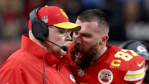 <p>Travis Kelce reacts at Head coach Andy Reid in the first half.</p>