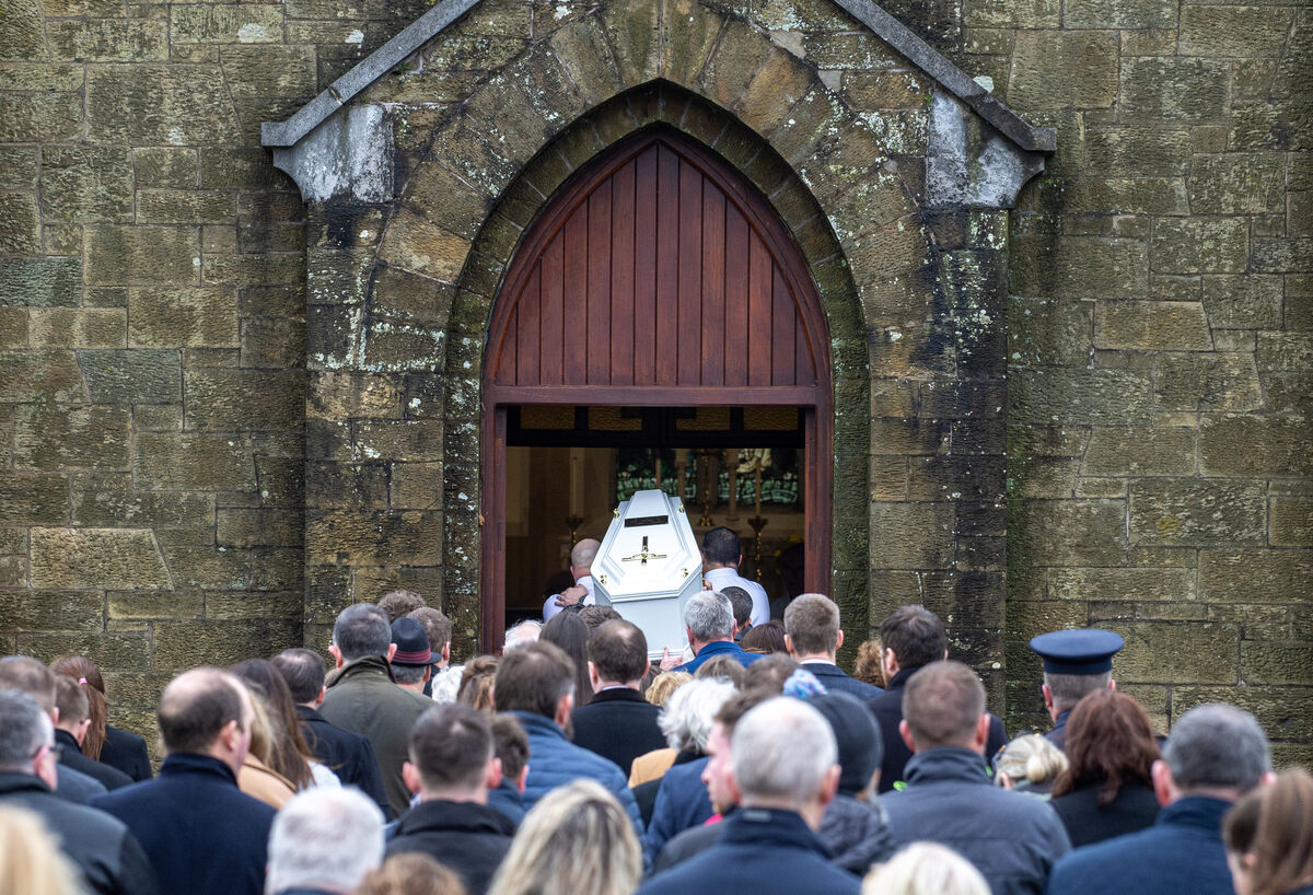  The coffin of Matthew James Healy is shouldered into the Church of the Immaculate Conception for requiem mass in Watergrasshill, Cork. Picture: Dan Linehan