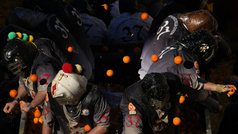 Pulp flies in traditional orange battle during Italian carnival Pulp flies in traditional orange battle during Italian carnival