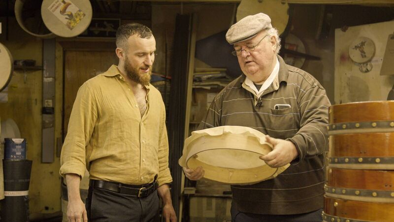  Roundstone bodhrán maker Malachy Kearns with Ruairí Glasheen.  