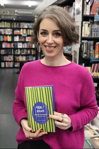 Victoria Kennefick with a copy of Egg/Shell. Picture: Dean Kelly