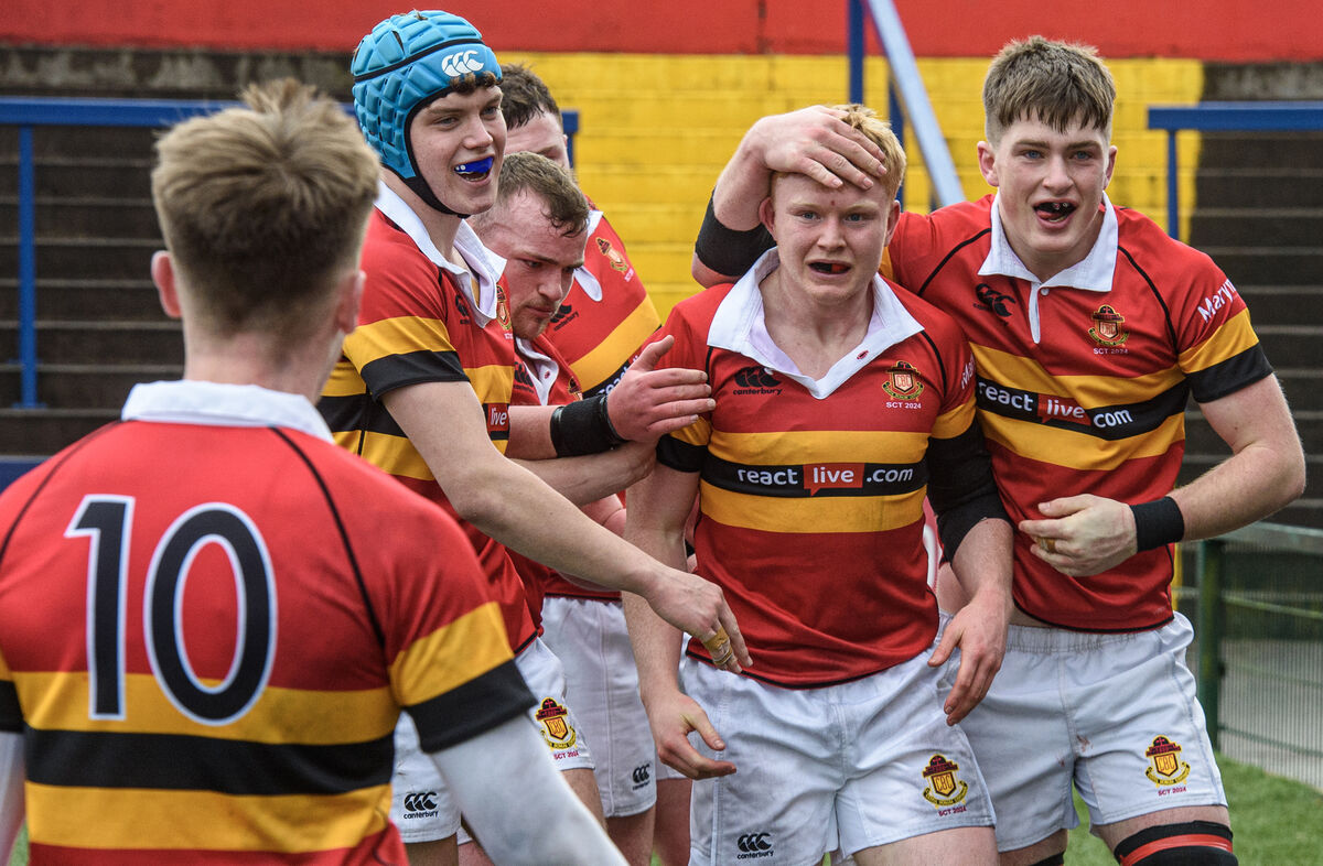  CBC hooker Darragh Prenter is congratulated after scoring his side's second try against Crescent Comprehensive in their Pinergy Munster School Boys Senior Cup semi-final match at Virgin Media Park, Cork. Picture Dan Linehan