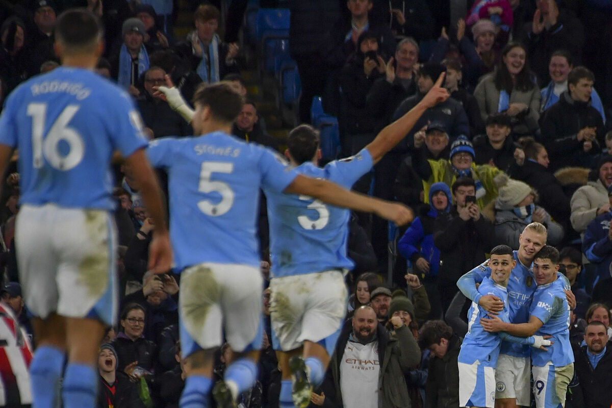 Manchester City's Erling Haaland celebrates with teammates after scoring his side's opening goal during the English Premier League soccer match between Manchester City and Brentford at the Etihad stadium in Manchester, England, Tuesday, Feb. 20, 2024. (AP Photo/Rui Vieira) Manchester City's Erling Haaland celebrates with teammates after scoring his side's opening goal during the English Premier League soccer match between Manchester City and Brentford at the Etihad stadium in Manchester, England, Tuesday, Feb. 20, 2024. (AP Photo/Rui Vieira)