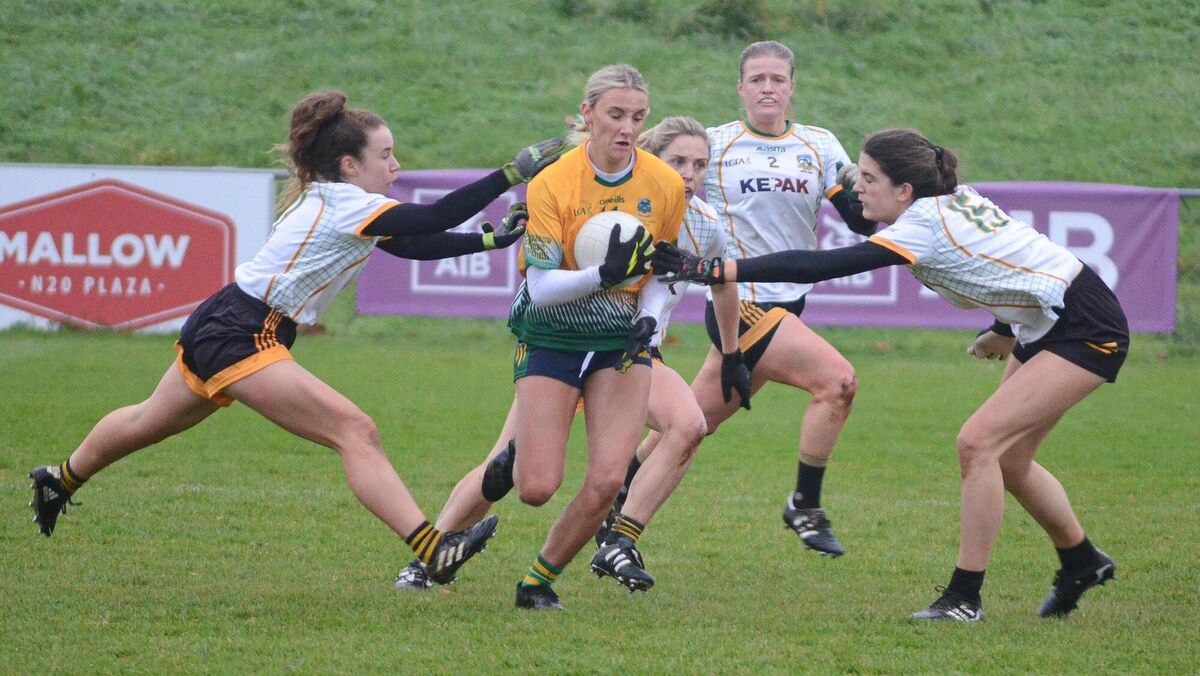 Glanmire's Orlaith Roche manages to evade the challenge from Na Fianna's Meabh Downey and Leah Devine during the LGFA All Ireland Intermediate Club Semi final match in Mallow. Picture: Howard Crowdy