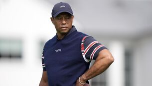 <p>Tiger Woods’s son Charlie will attempt to qualify for his first PGA Tour event, officials have revealed (Ryan Sun/AP)</p>