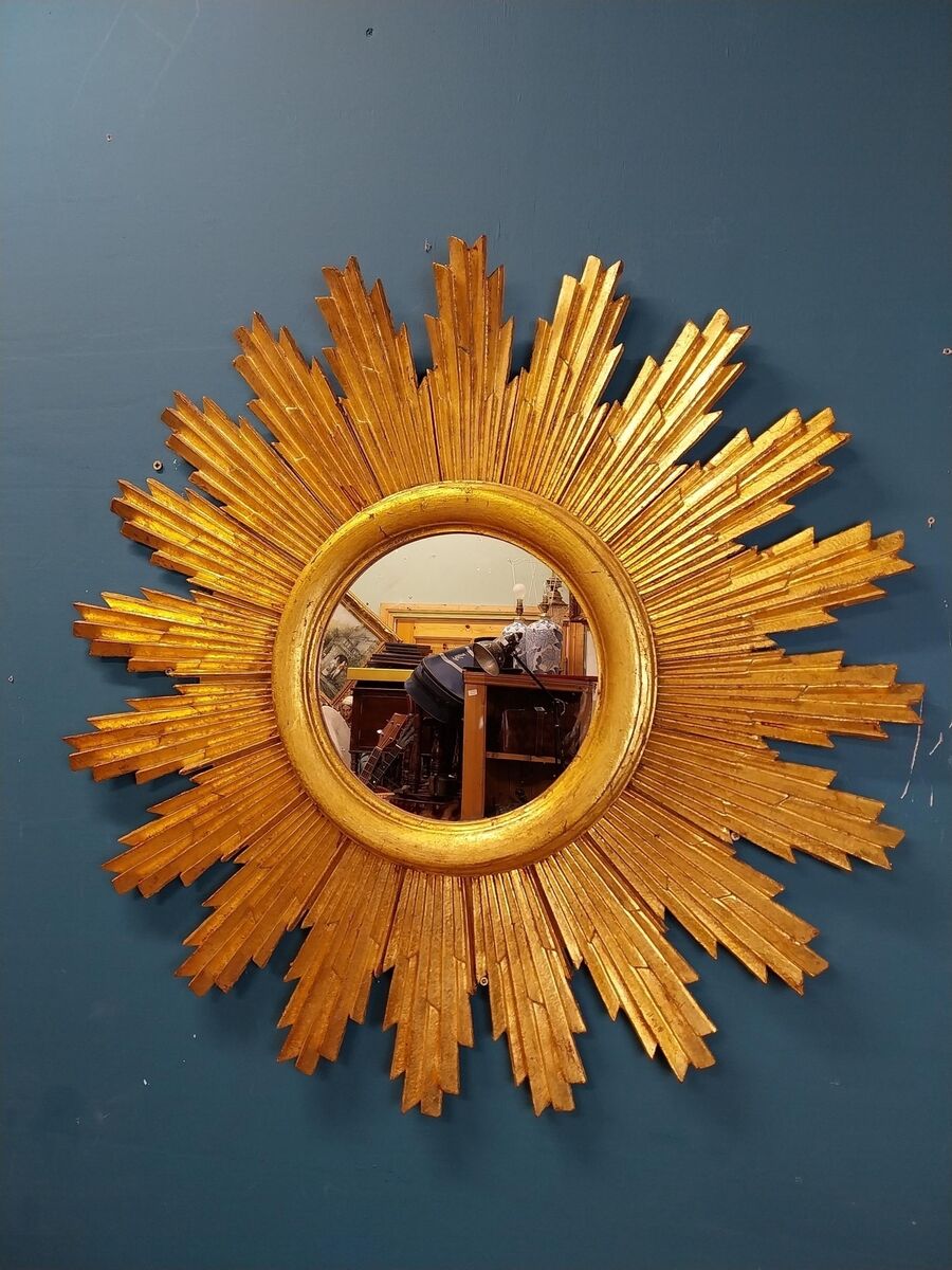  A sunburst mirror at Victor Mee's sale.
