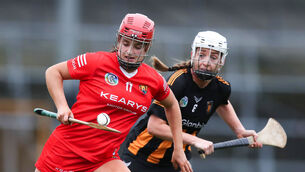 <p>GOOD TIMES AHEAD: Cork’s Fiona Keating with Miriam Bambrick of Kilkenny. Pic: Leah Scholes, Inpho</p>
