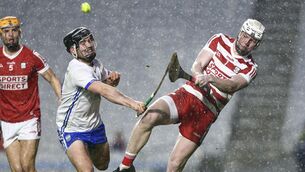 <p>STEPPING UP: Cork’s Brion Saunderson in action against Waterford’s Charlie Treen. Pic: Ken Sutton, Inpho</p>