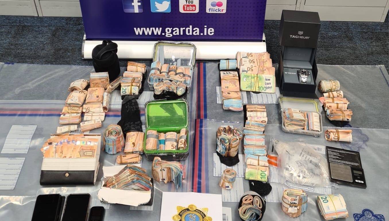 Cash, a designer watch and several mobile phones were confiscated by Gardaí. Picture: An Garda Síochána