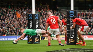 <p>BONUS-POINT CLINCHER: Ciarán Frawley of Ireland scores his side's fourth try. Pic: Ramsey Cardy, Sportsfile</p>