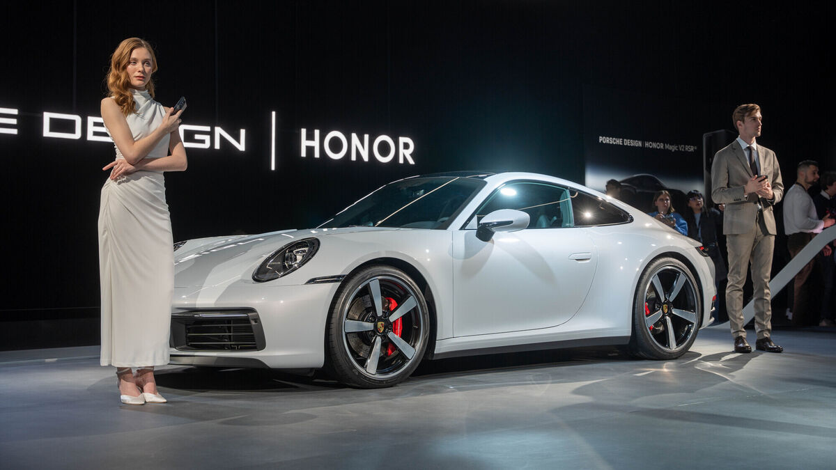 Models displaying the Porsche Design Honor Magic V2 foldable. Picture: Noel Campion.