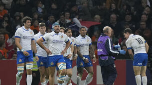 Italy players celebrate after Ange Capuozzo scored a late try in their 13-13 Six Nations draw with France (Lewis Joly/AP)