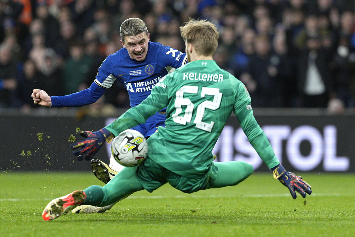Chelsea's Conor Gallagher makes an attempt to score past Liverpool's goalkeeper Caoimhin Kelleher. AP Photo/Dave Shopland.