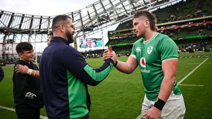 <p>Ireland head coach Andy Farrell, left, and Joe McCarthy celebrate. Pic: Ramsey Cardy, Sportsfile</p>