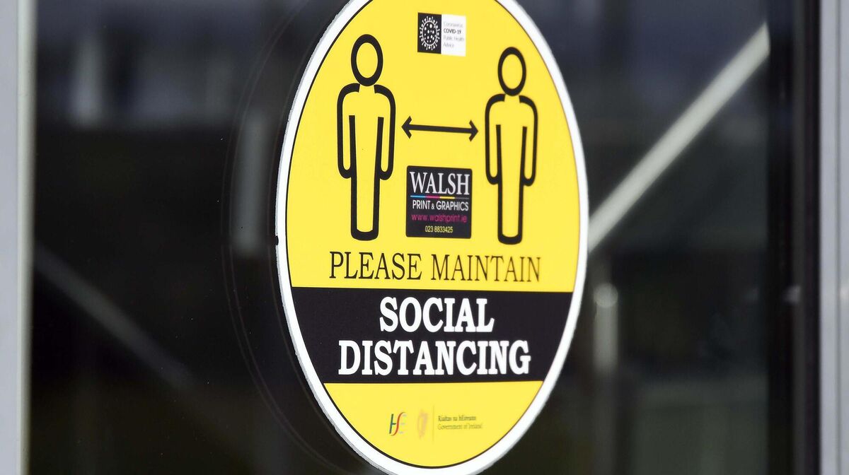 A covid-19 sign about social distancing. Picture: Denis Minihane A covid-19 sign about social distancing. Picture: Denis Minihane