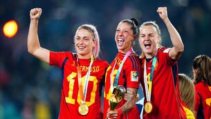 <p>Spain’s Jenni Hermoso, centre, celebrates with team-mates Alexia Putellas, left, and Irene Paredes after winning the FIFA Women’s World Cup (Zac Goodwin/PA)</p>