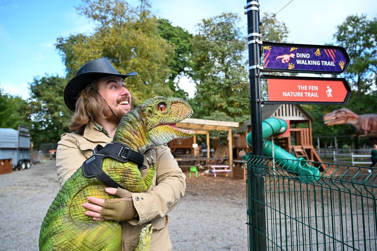 Jurassic Newpark theme park features 12 life-size, moving dinosaurs and Jurassic Bounce.