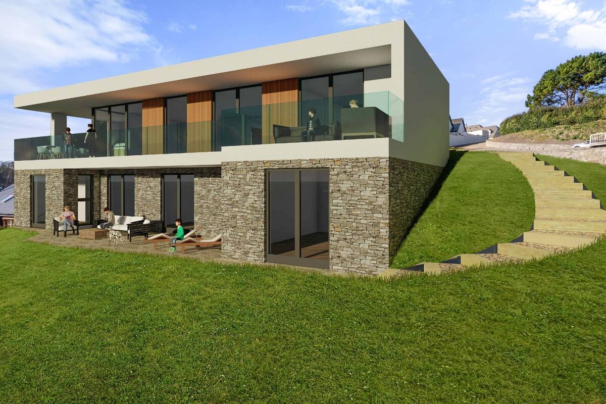 Concrete builds on both levels, with part-stone facade and extensive glazing for the Atlantic views Concrete builds on both levels, with part-stone facade and extensive glazing for the Atlantic views