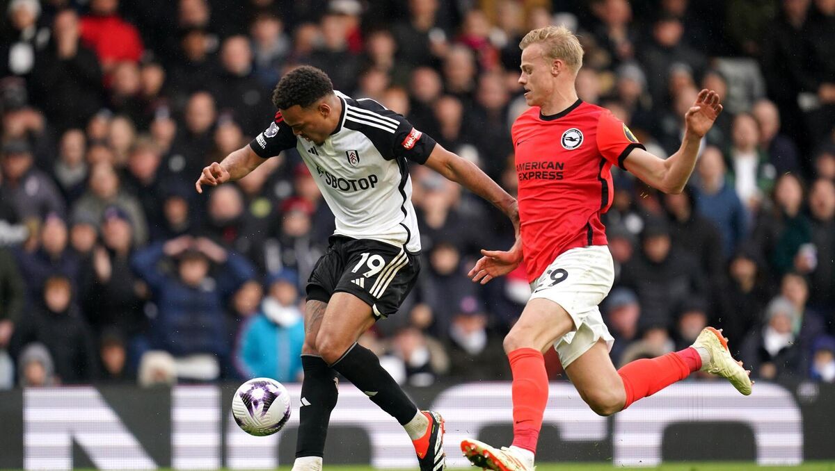 Fulham's Rodrigo Muniz (left) and Brighton and Hove Albion's Jan Paul van Hecke battle for the ball. Picture: Adam Davy/PA Wire.