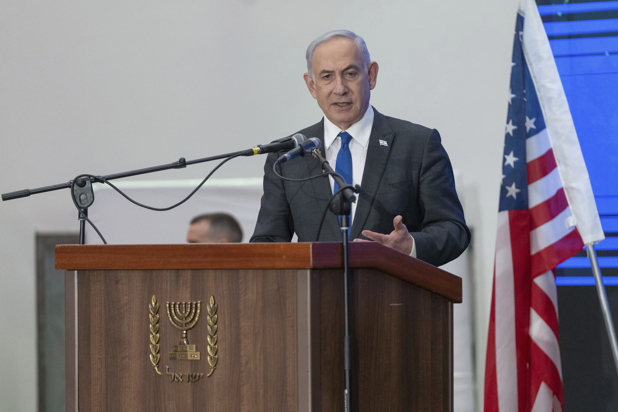 Cracks widen in Netanyahu’s government as top political rival heads to US talks